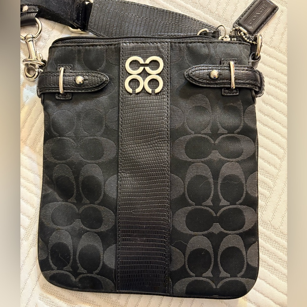 black Coach Signature canvas crossbody bag